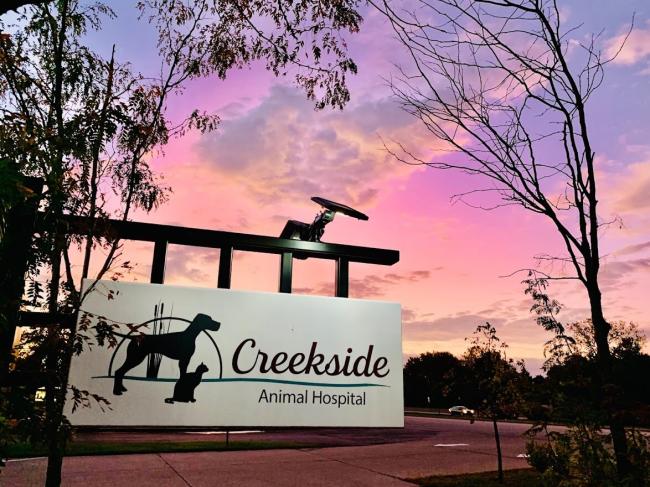 creekside sign sunrise